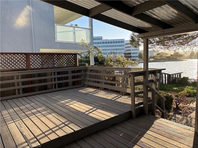 wooden terrace with a water view