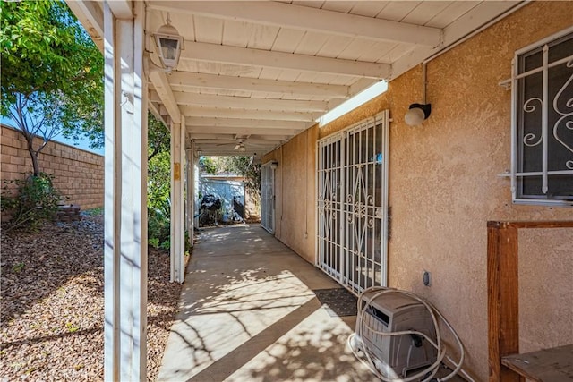 view of patio / terrace featuring fence