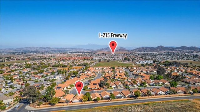 bird's eye view with a residential view and a mountain view