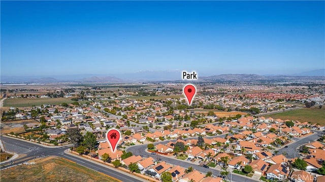 aerial view with a residential view and a mountain view