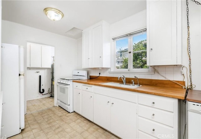 kitchen with white cabinetry, sink, white appliances, and decorative backsplash