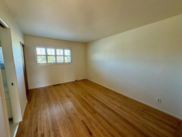 empty room featuring light hardwood / wood-style floors