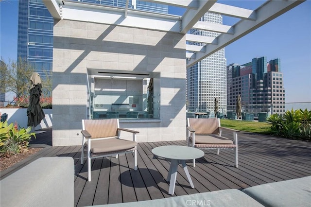 wooden terrace featuring a pergola