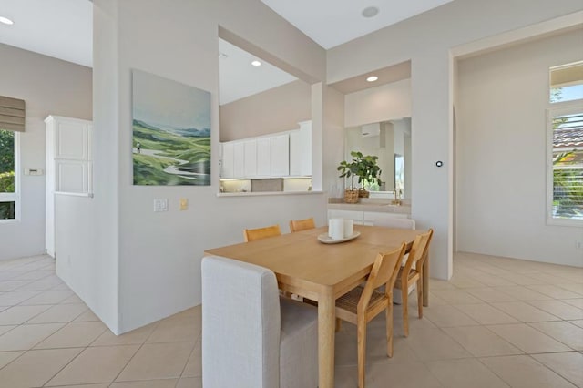 dining space with light tile patterned flooring