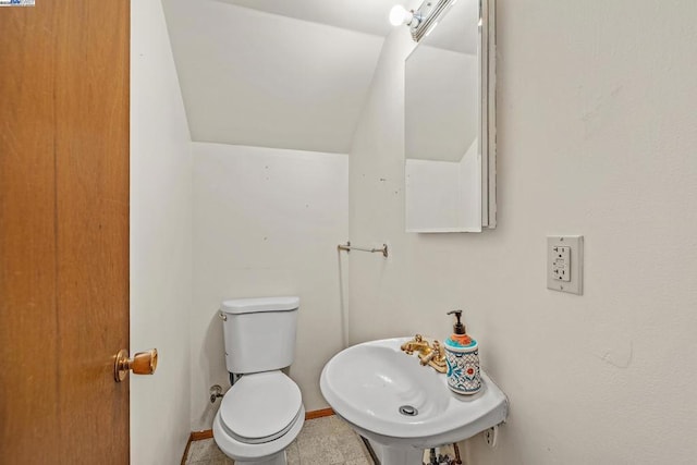 bathroom featuring toilet and sink