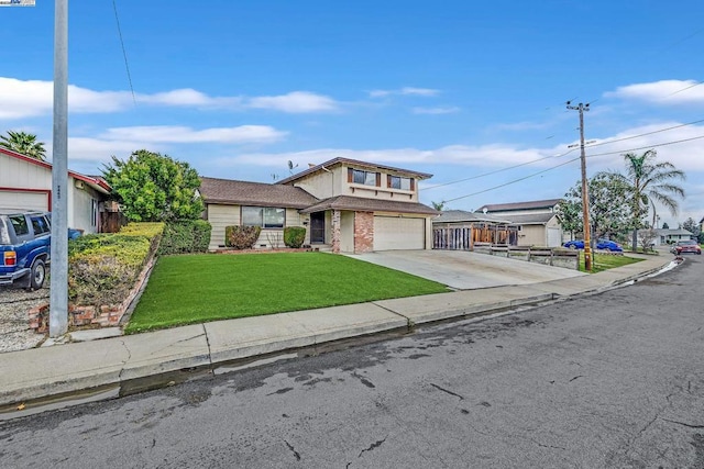 view of property with a garage and a front yard