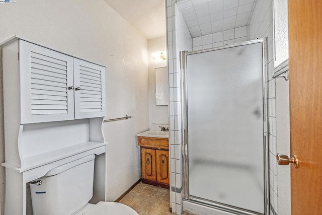 bathroom featuring walk in shower, vanity, and toilet