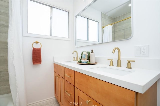 bathroom featuring vanity and walk in shower