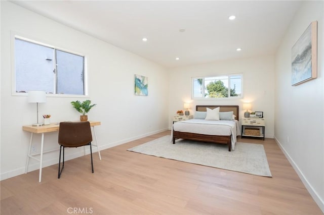 bedroom with light hardwood / wood-style floors