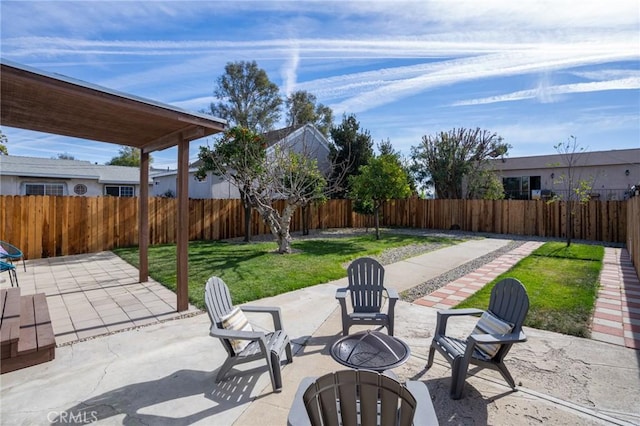 view of patio / terrace with a fire pit