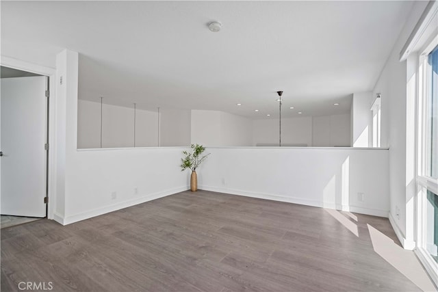 unfurnished room with light hardwood / wood-style floors