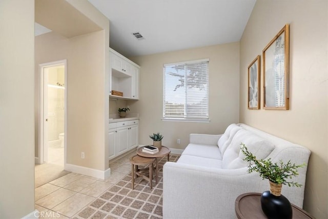 living room featuring light tile patterned floors