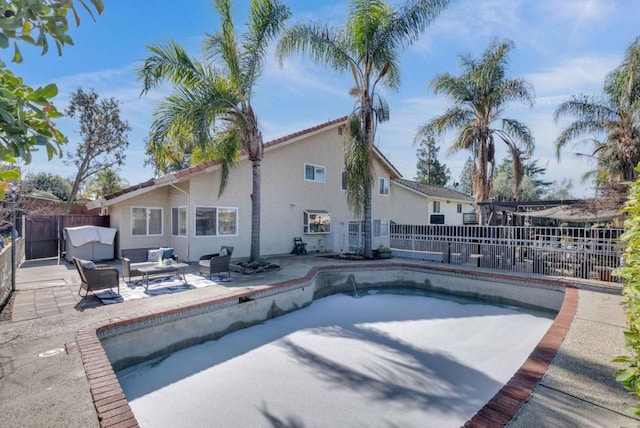 view of pool with outdoor lounge area and a patio area