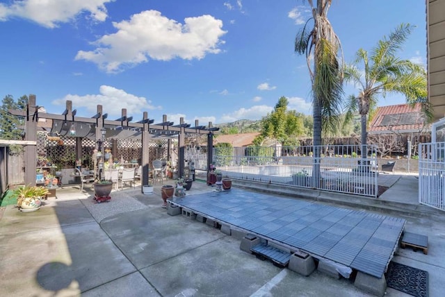 surrounding community featuring a pergola and a patio area