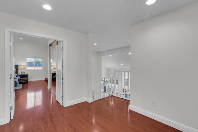 corridor featuring wood-type flooring