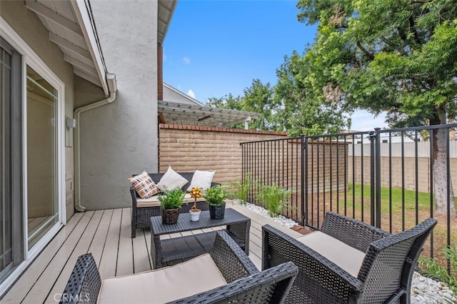 balcony with outdoor lounge area and a pergola