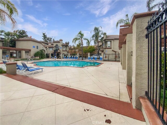 view of pool featuring a patio area