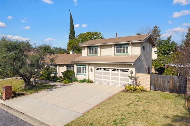 front facade featuring a garage and a front yard