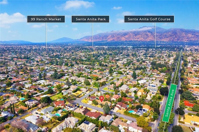 drone / aerial view featuring a mountain view