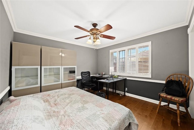 bedroom with ornamental molding, ceiling fan, and dark hardwood / wood-style flooring