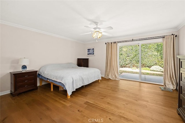 bedroom featuring ornamental molding, access to outside, ceiling fan, and light hardwood / wood-style flooring