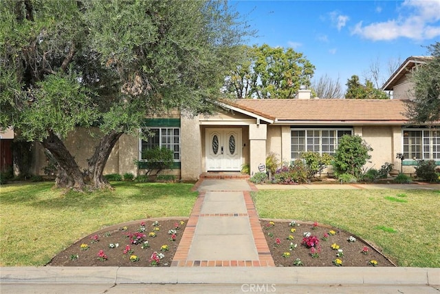 view of front of home with a front yard