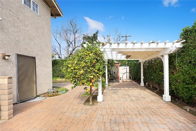 view of patio featuring a pergola