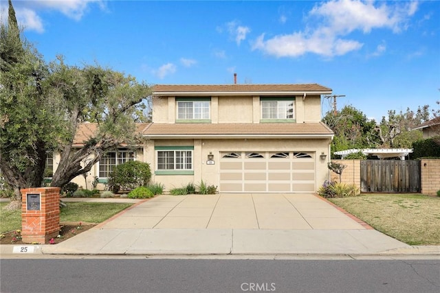 front facade featuring a garage and a front lawn