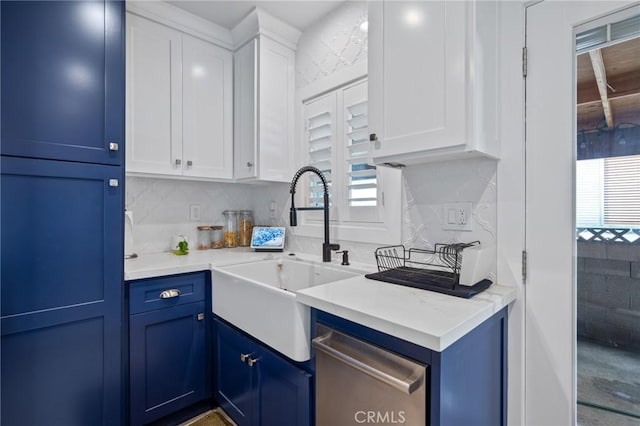 kitchen featuring blue cabinetry, sink, white cabinetry, dishwasher, and light stone countertops