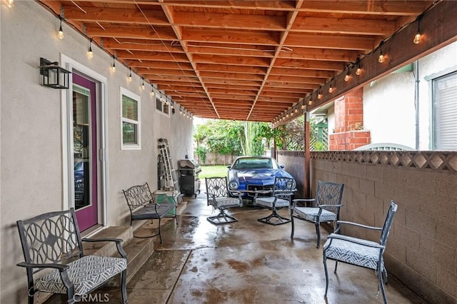 view of patio with a grill