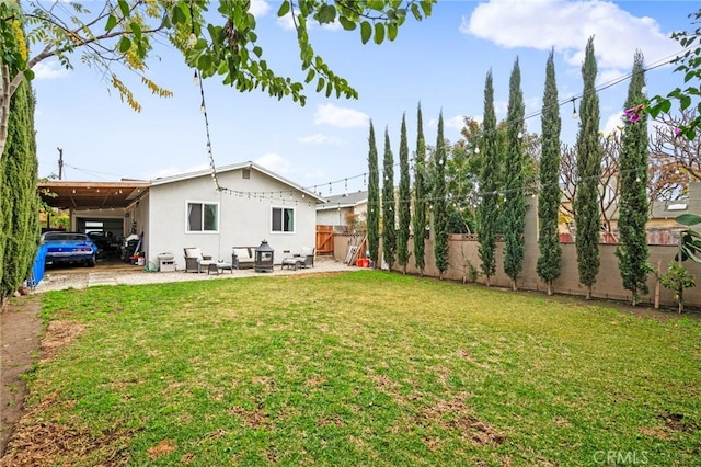 view of yard with a carport