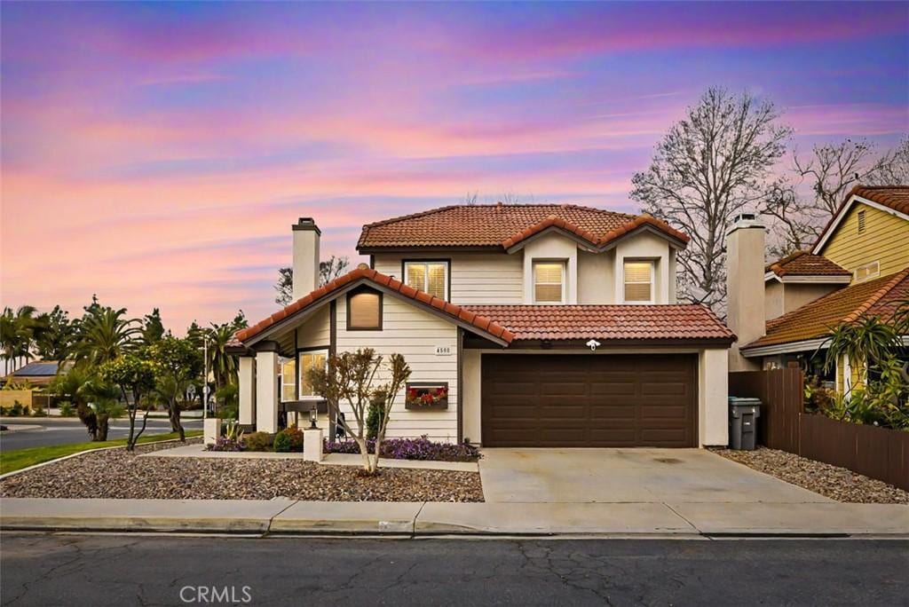 view of front of home with a garage