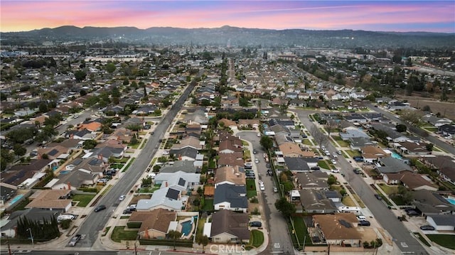 aerial view at dusk with a mountain view