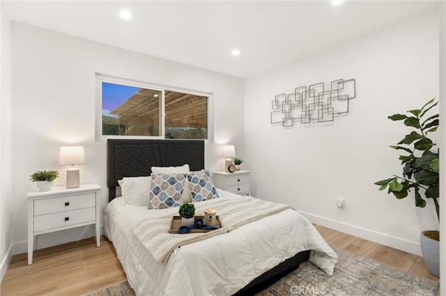 bedroom featuring light wood-type flooring