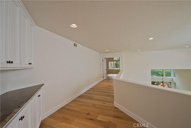 hallway featuring light wood-type flooring