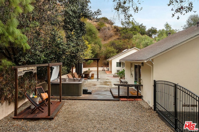 exterior space featuring outdoor lounge area and a deck