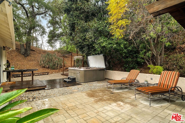 view of patio featuring a hot tub