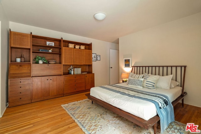 bedroom featuring light hardwood / wood-style flooring