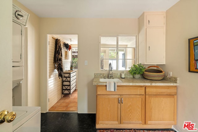 kitchen featuring sink and light brown cabinets