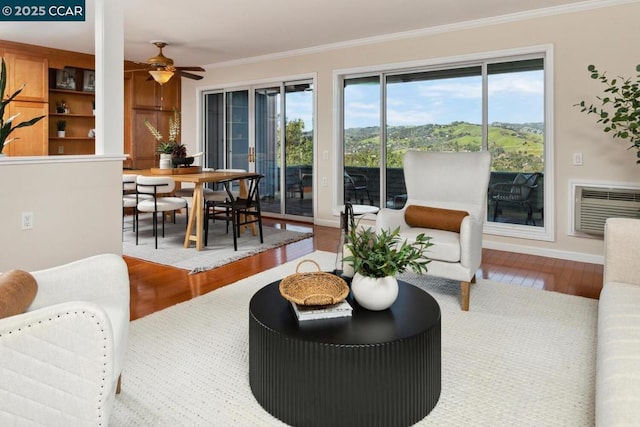 interior space with an AC wall unit and ceiling fan