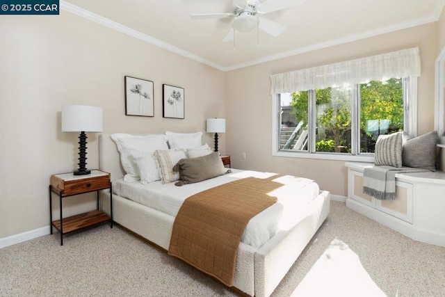 bedroom with crown molding, light colored carpet, and ceiling fan