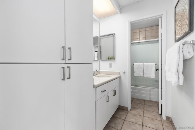 bathroom with vanity, tile patterned floors, and shower / bath combination with glass door