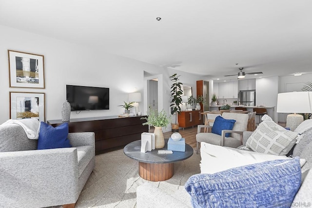 living room featuring ceiling fan