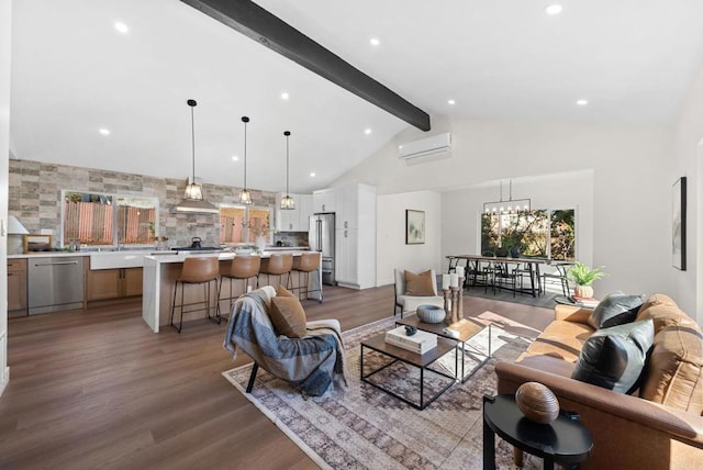 living room featuring beam ceiling, a notable chandelier, recessed lighting, light wood-style floors, and an AC wall unit