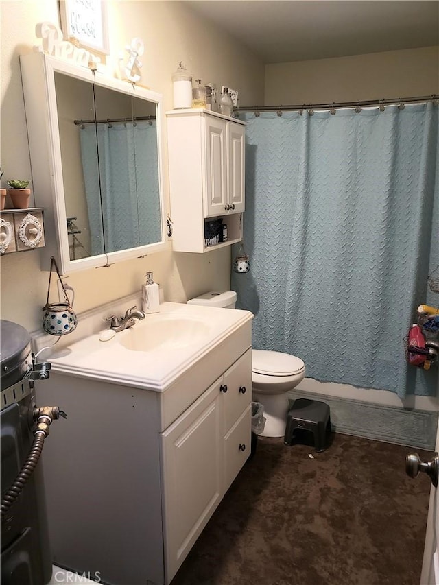 bathroom featuring vanity, a shower with curtain, and toilet
