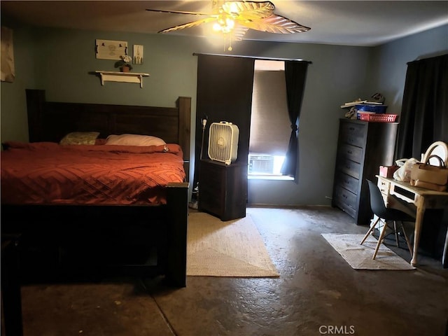 bedroom with concrete floors and ceiling fan