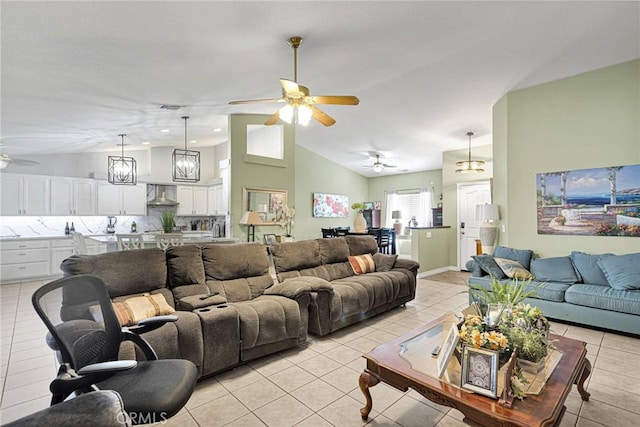 tiled living room featuring lofted ceiling and ceiling fan