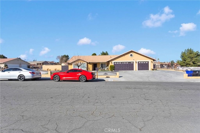 single story home with a garage