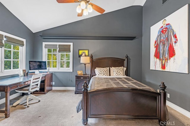 carpeted bedroom with ceiling fan, lofted ceiling, and multiple windows