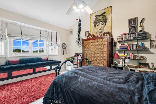 carpeted bedroom featuring vaulted ceiling